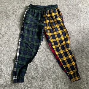Mens small, plaid, red white green yellow and blue pants.